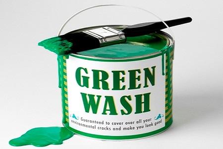 Barattolo di vernice verde con l'etichetta Green wash, simbolo del greenwashing
