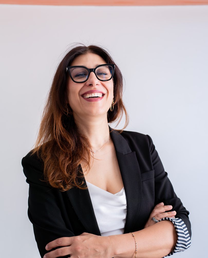 Ritratto sorridente di una persona del team GOODCOM